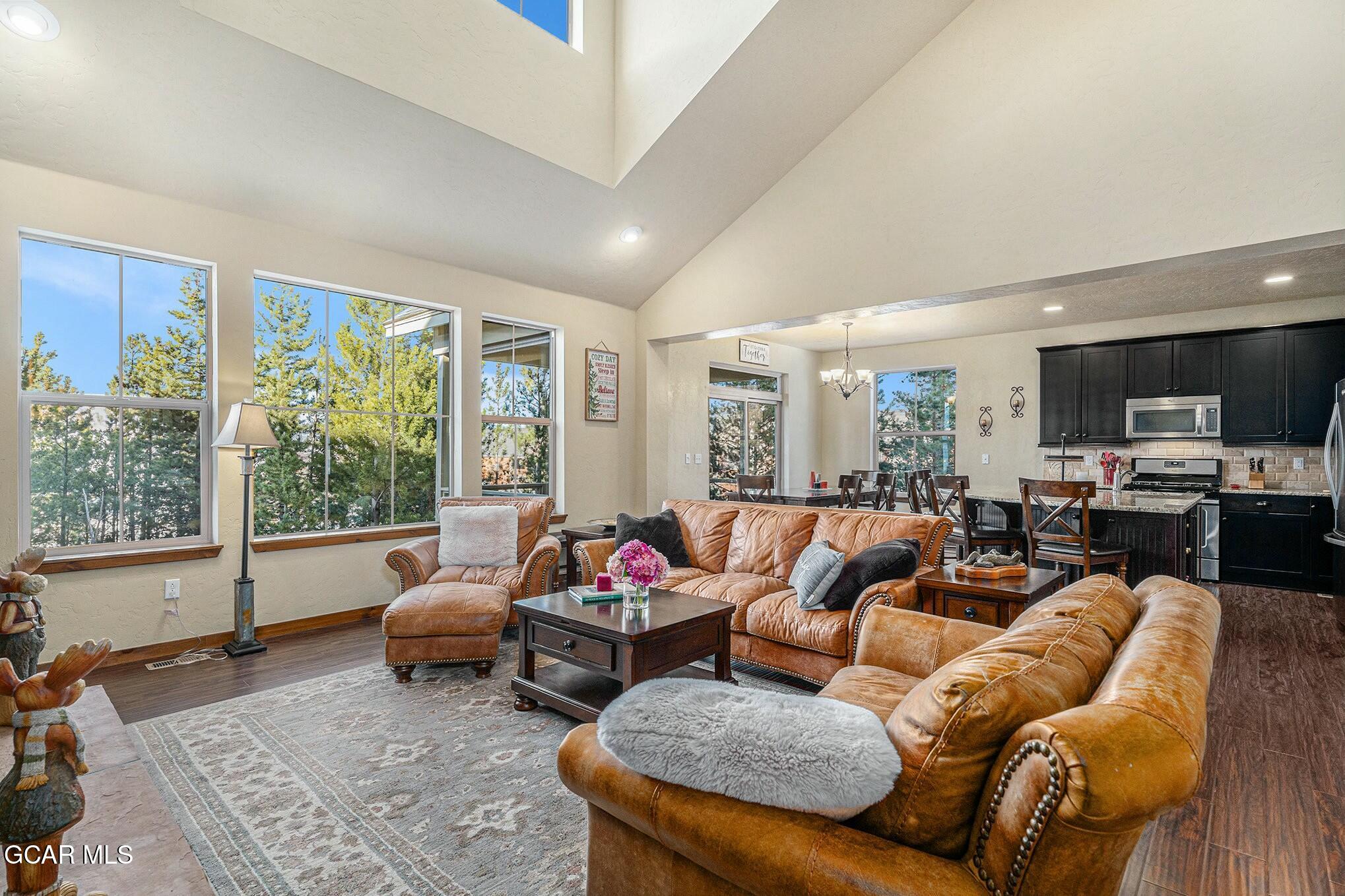 160 First Track Lane Granby, CO 80446 - Photo 7 of 27 a living room with furniture and a large window