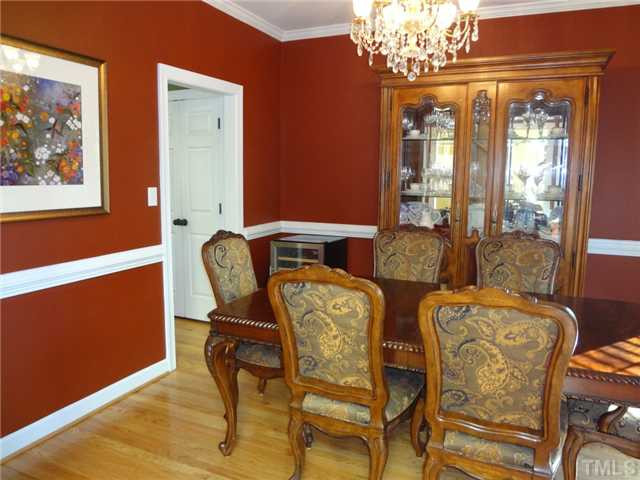 2701 Dray Court Raleigh, NC 27613 - Photo 13 of 25 Crystal Chandelier, Crown Molding, Chair Rail Dining Room