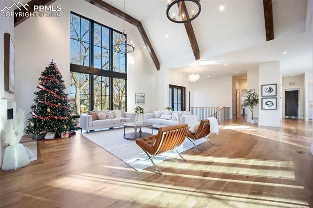 a living room with furniture or window and a potted plant