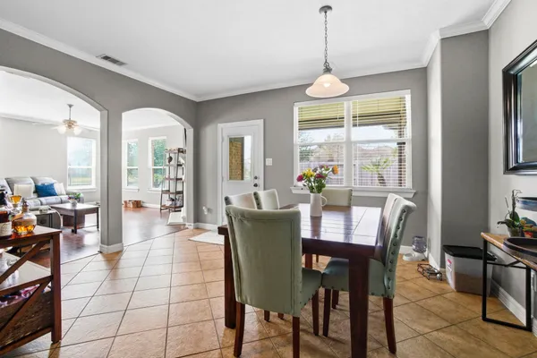 a view of a dining room with furniture