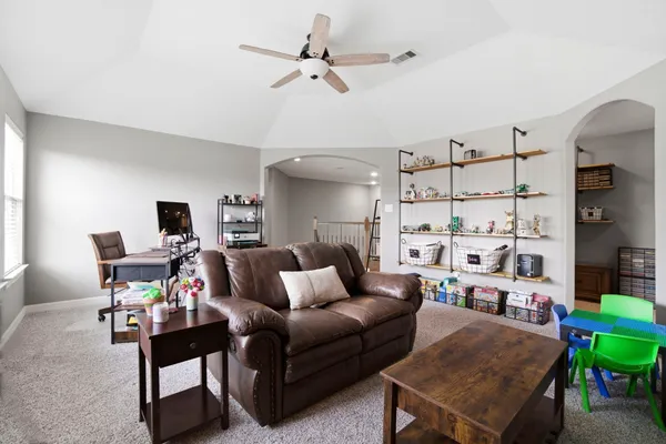 a en suite bathroom with a sink double vanity granite and a mirror