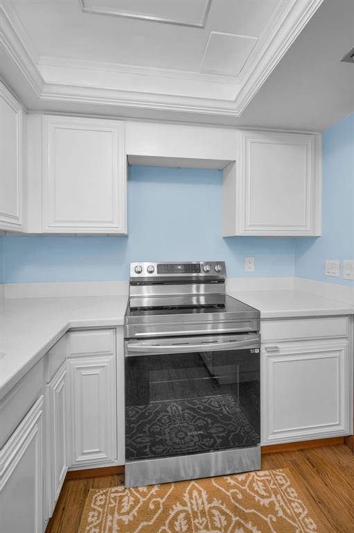 9495 Blind Pass Road, Unit 205 St. Pete Beach, FL 33706 - Photo 20 of 71 a stove top oven sitting inside of a kitchen