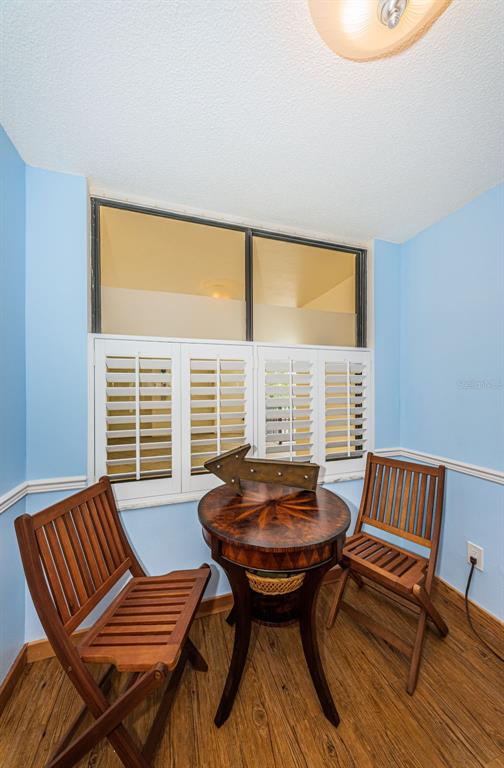 9495 Blind Pass Road, Unit 205 St. Pete Beach, FL 33706 - Photo 21 of 71 a view of a livingroom with furniture and a window