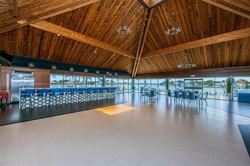 9495 Blind Pass Road, Unit 205 St. Pete Beach, FL 33706 - Photo 50 of 71 a view of swimming pool with a patio