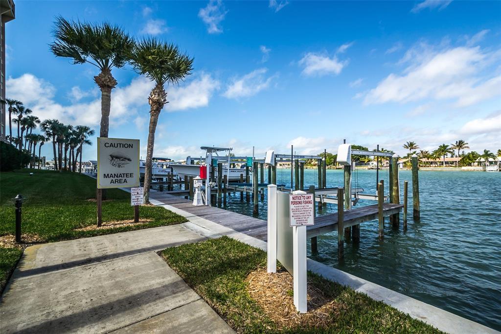 9495 Blind Pass Road, Unit 205 St. Pete Beach, FL 33706 - Photo 65 of 71 a view of a balcony with lake view