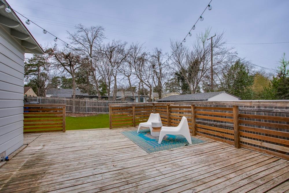 1331 Michigan Avenue Dallas, TX 75216 - Photo 35 of 40 a view of a bench sitting on a wooden floor