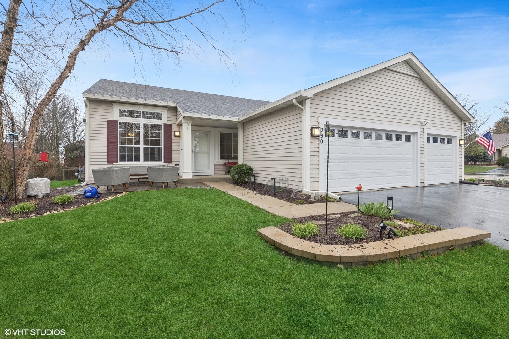 a view of a house with a backyard