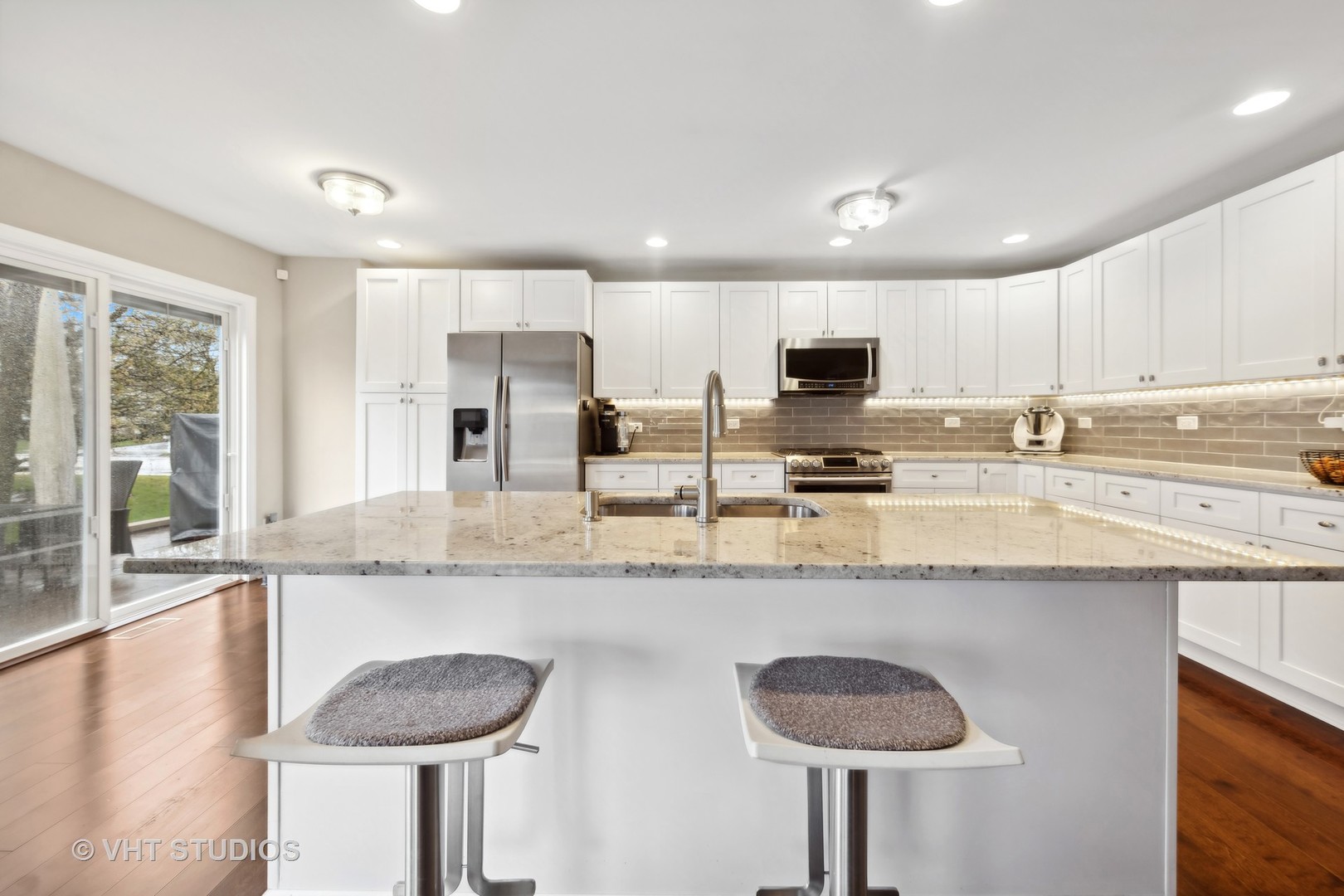 230 Willow Bend Bolingbrook, IL 60490 - Photo 11 of 29 a kitchen with granite countertop a counter space a sink and cabinets