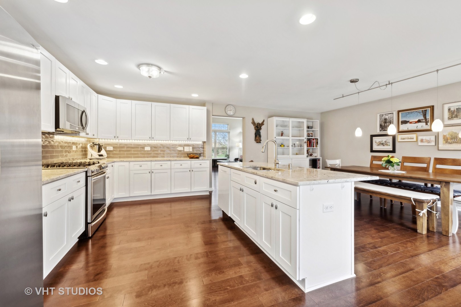 230 Willow Bend Bolingbrook, IL 60490 - Photo 13 of 29 a large white kitchen with stainless steel appliances lots of counter top space