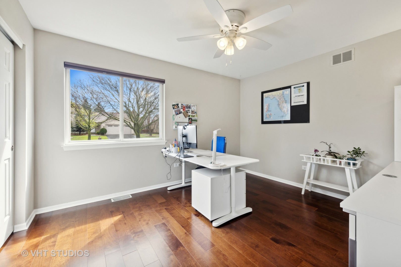 230 Willow Bend Bolingbrook, IL 60490 - Photo 18 of 29 a workspace with furniture window and wooden floor