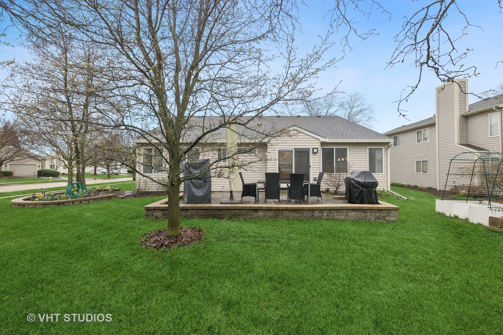 230 Willow Bend Bolingbrook, IL 60490 - Photo 4 of 29 a front view of a house with garden and tree