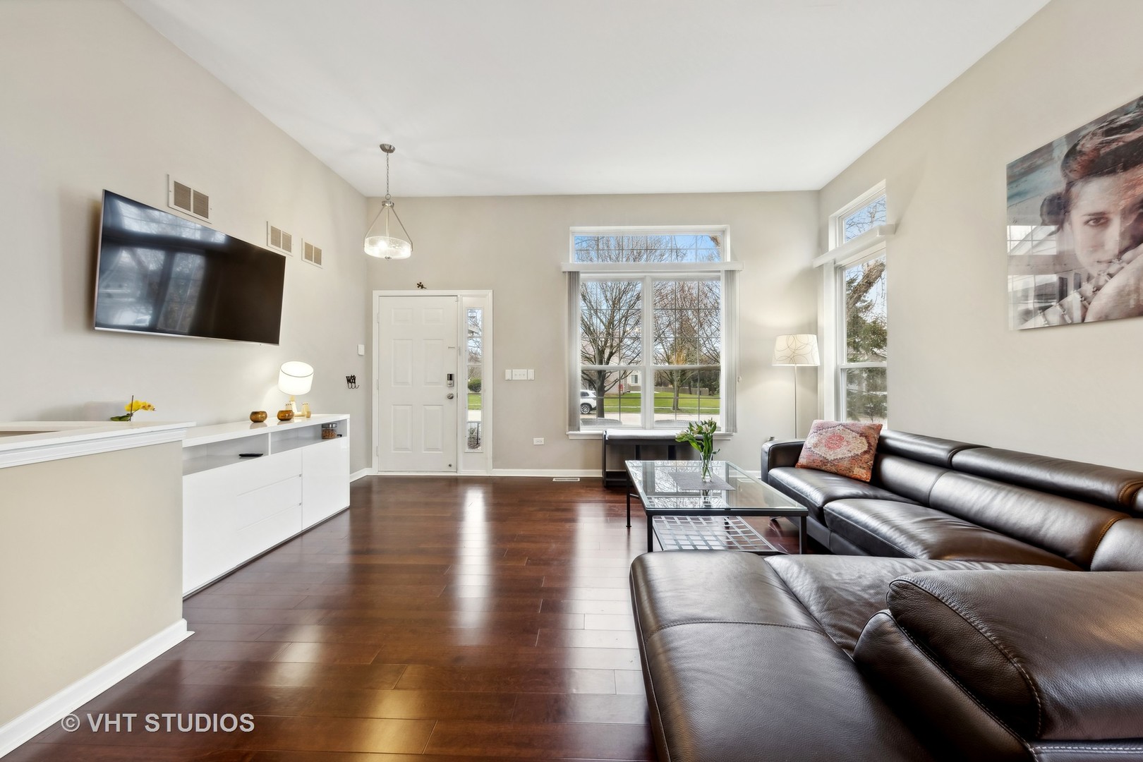 230 Willow Bend Bolingbrook, IL 60490 - Photo 8 of 29 a living room with furniture and a flat screen tv