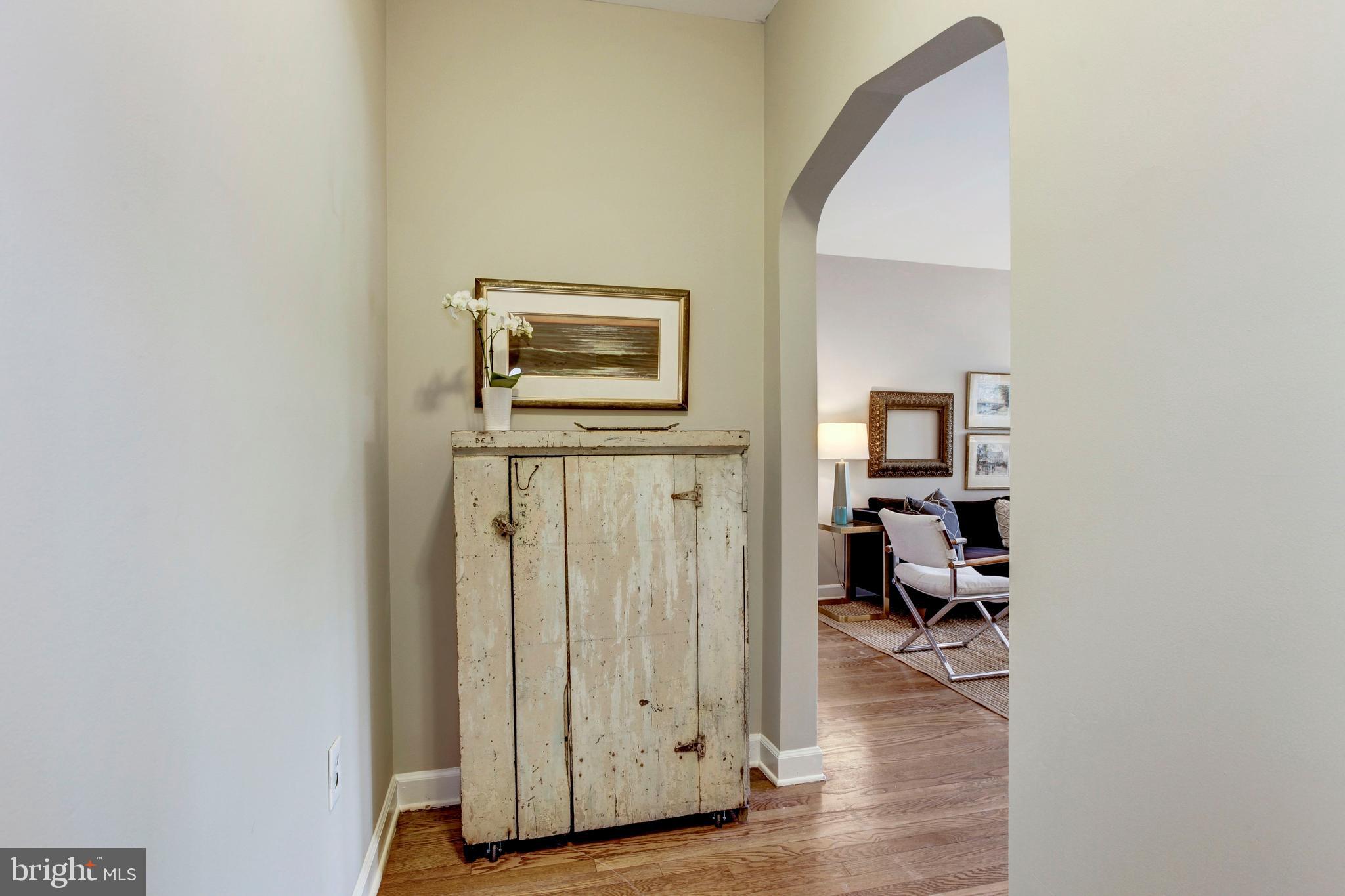 1615 Kenyon Street Northwest, Unit 38 Washington, DC 20010 - Photo 2 of 20 Proper entry foyer! Wood floors throughout!