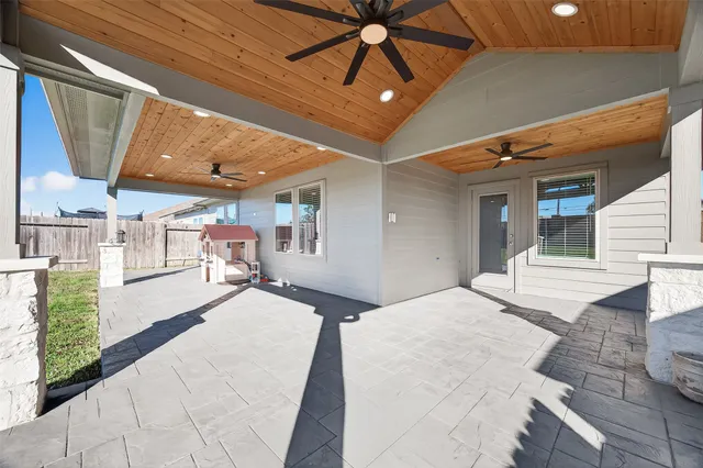 a spacious bathroom with a tub and shower