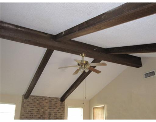 1618 Cheyenne Street Portland, TX 78374 - Photo 2 of 7 a very nice looking room with a ceiling fan