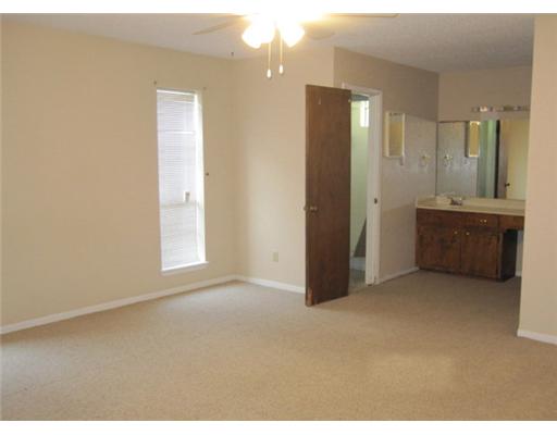 1618 Cheyenne Street Portland, TX 78374 - Photo 6 of 7 a view of an empty room with closet and a bathroom
