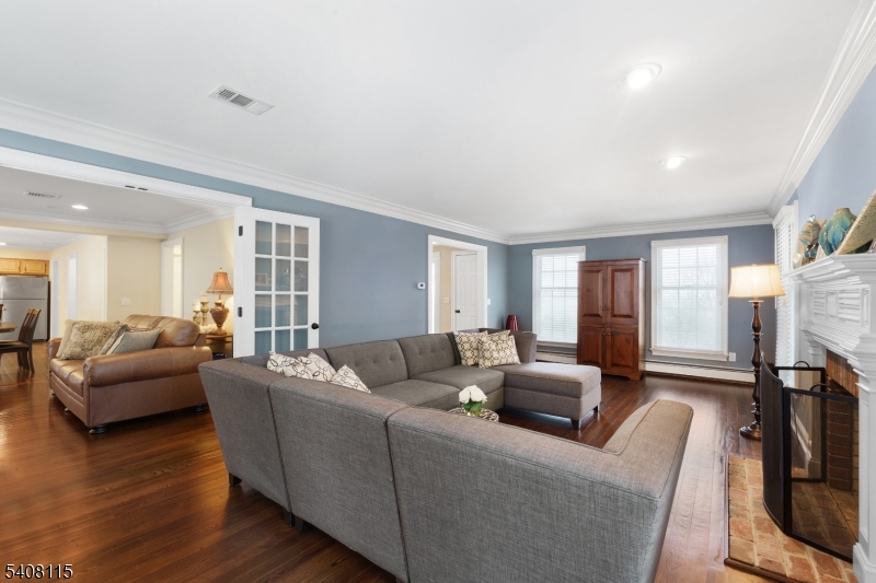 12 Waldon Road Califon, NJ 07830 - Photo 11 of 34 a living room with furniture and a flat screen tv