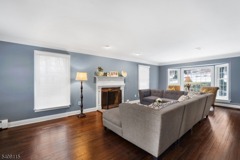 12 Waldon Road Califon, NJ 07830 - Photo 12 of 34 a living room with furniture and a fireplace
