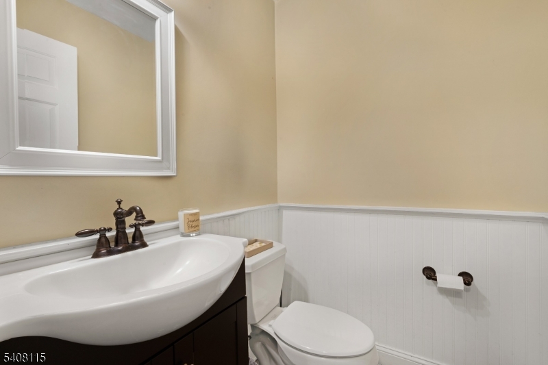 12 Waldon Road Califon, NJ 07830 - Photo 13 of 34 a bathroom with a sink a toilet and mirror