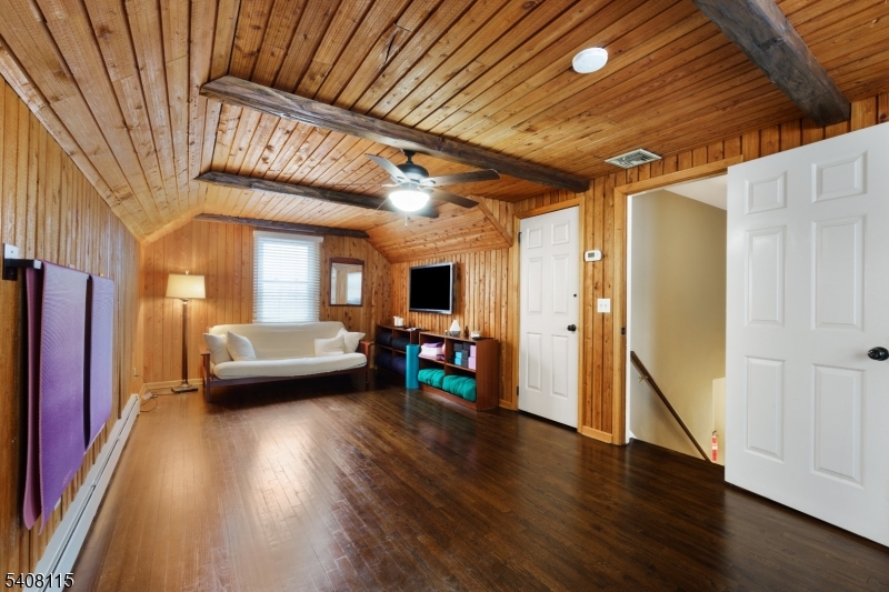 12 Waldon Road Califon, NJ 07830 - Photo 22 of 34 a view of a livingroom with furniture and a ceiling fan