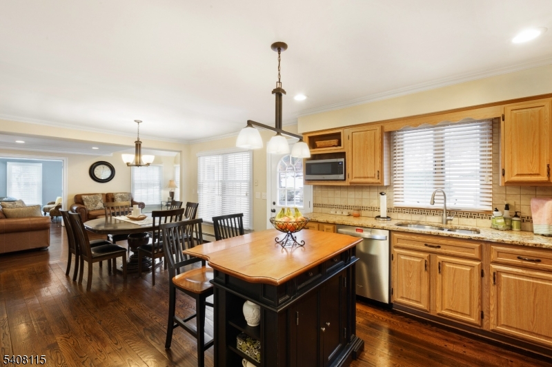 12 Waldon Road Califon, NJ 07830 - Photo 7 of 34 a kitchen with lots of counter top space and dining table
