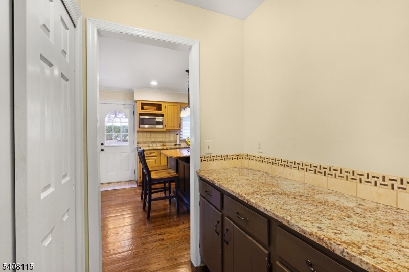 12 Waldon Road Califon, NJ 07830 - Photo 8 of 34 a view of a kitchen from the hallway