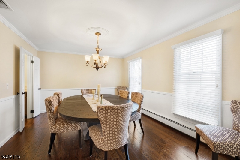 12 Waldon Road Califon, NJ 07830 - Photo 9 of 34 a view of a dining room with furniture window and wooden floor