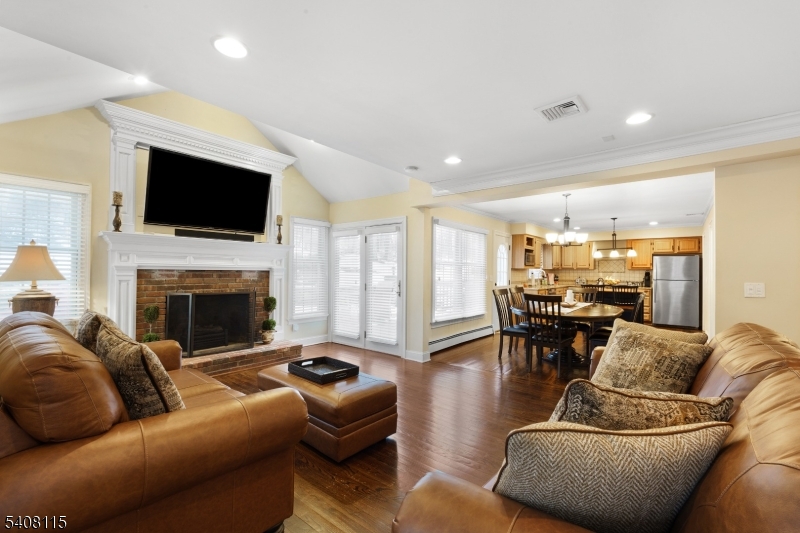 12 Waldon Road Califon, NJ 07830 - Photo 10 of 34 a living room with furniture fireplace and flat screen tv