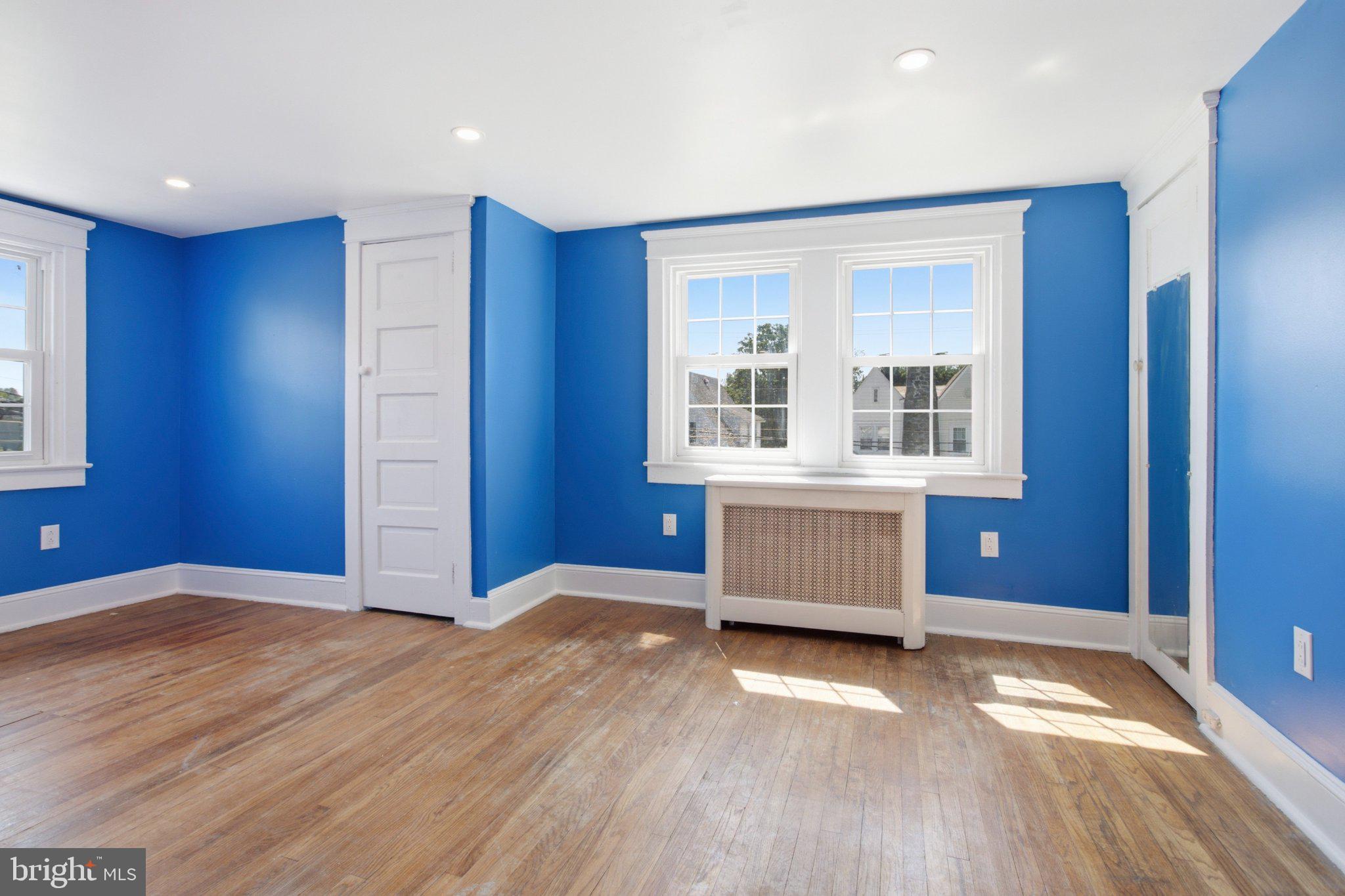 316 Powell Road Springfield, PA 19064 - Photo 17 of 23 Vibrant blue walls invite creativity.