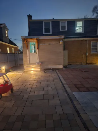 a view of a house with a patio
