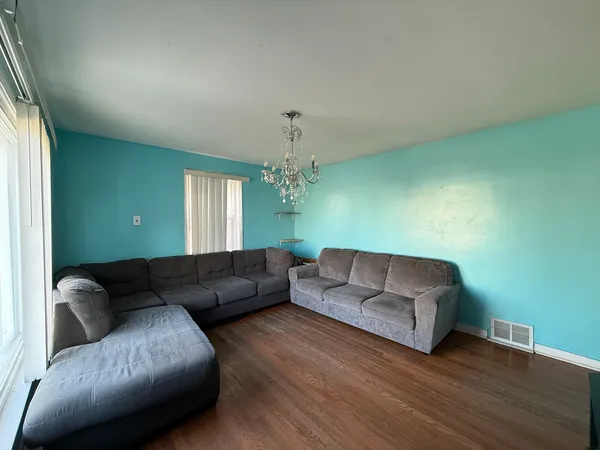 a living room with furniture and a couch