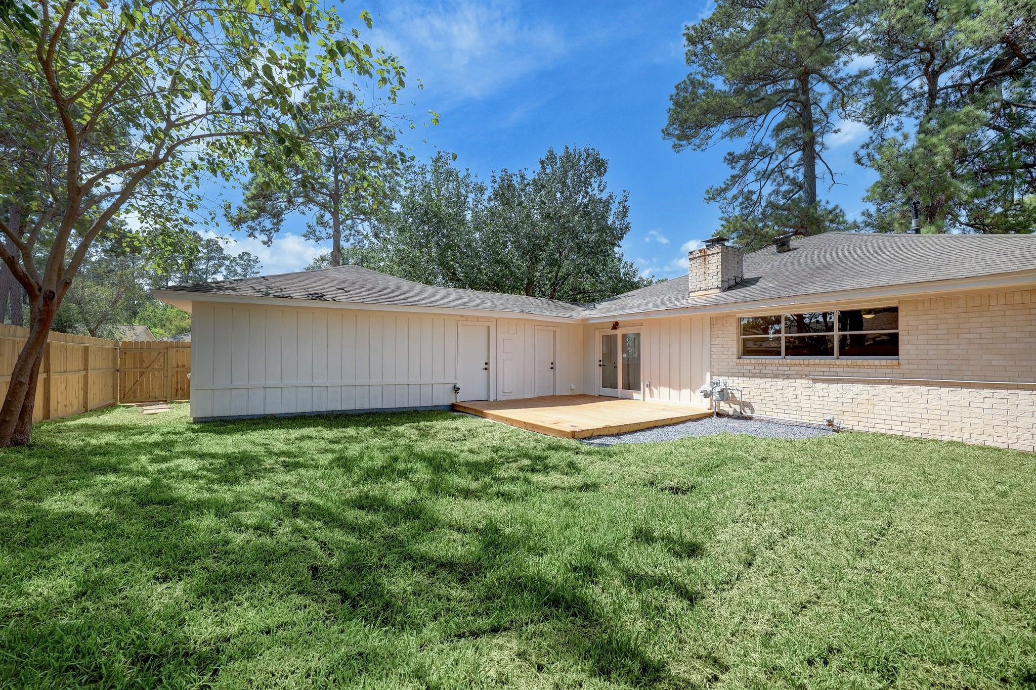9723 Galston Lane Spring, TX 77379 - Photo 23 of 24 The fully fenced backyard offers plenty of room for outdoor activities, gardening, or simply soaking in the peaceful surroundings.