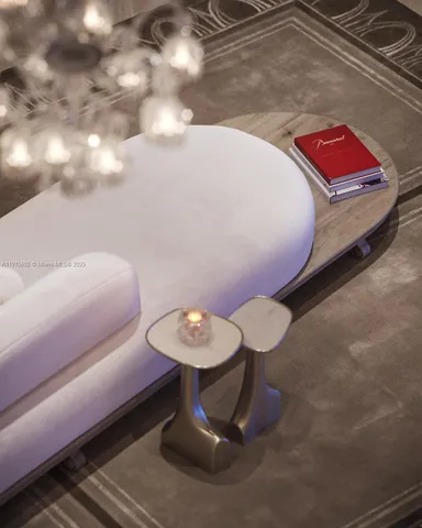 a view of a lobby with furniture and floor to ceiling window and potted plants