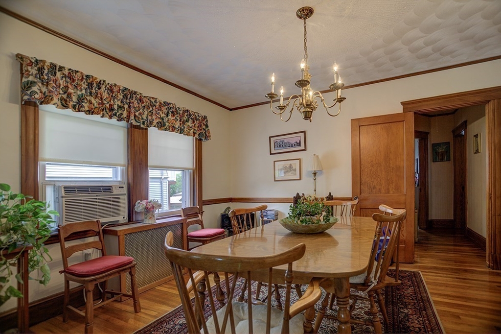 44 Cottage Park Road Winthrop, MA 02152 - Photo 28 of 39 a view of a dining room with furniture and wooden floor