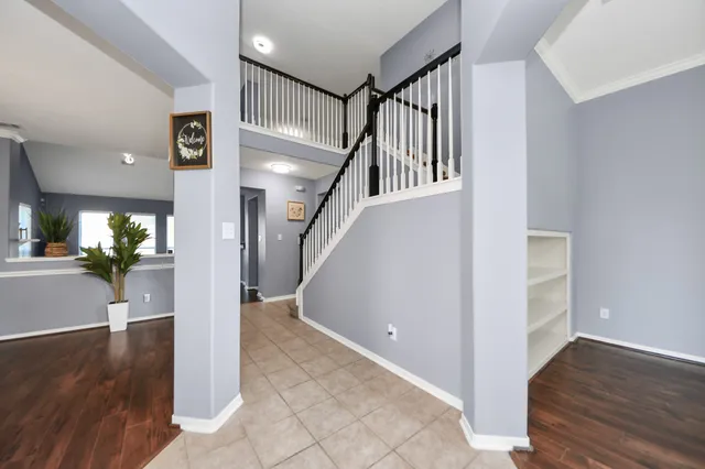 a view or entryway and hall with wooden floor