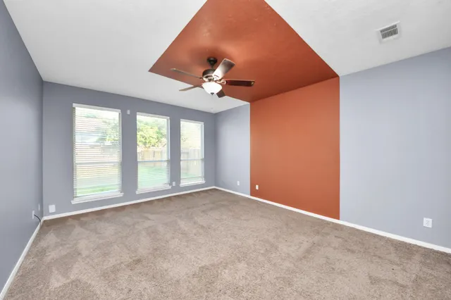 a bathroom with a tub and a shower