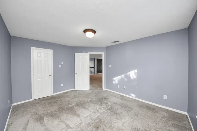 a en suite bathroom with a sink a mirror and a shower