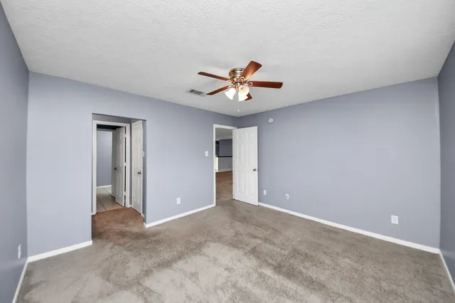 a view of a backyard with a garden