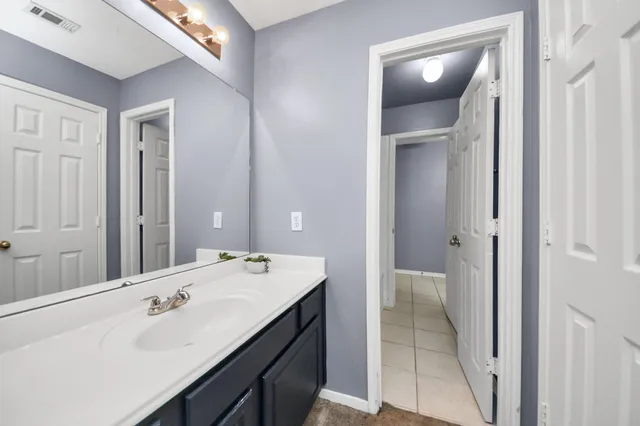 a front view of a house with a yard and porch