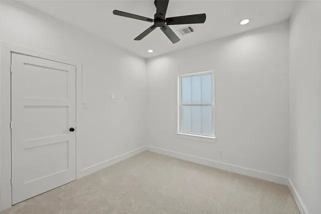 a view of an empty room and window