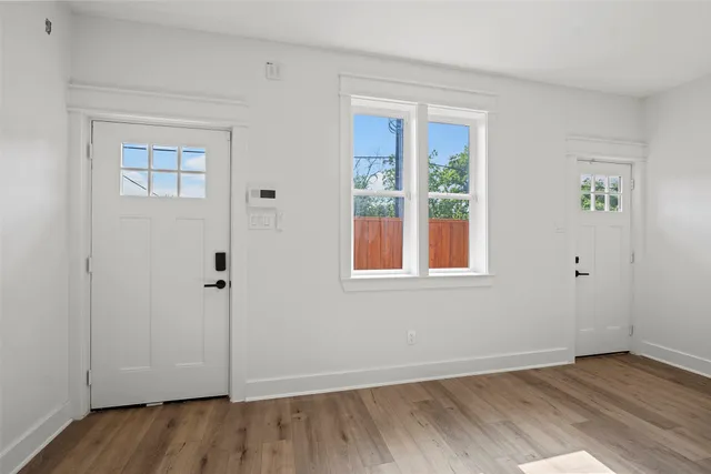 a view of a brick house with stairs