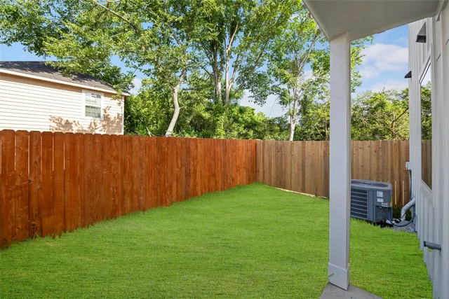 a view of a back yard of the house
