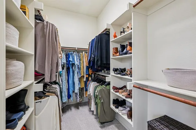 a view of a house with backyard and porch