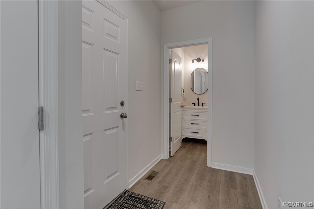 15736 Henningford Road Chesterfield, VA 23832 - Photo 25 of 50 The first-floor Half Bathroom is privately tucked