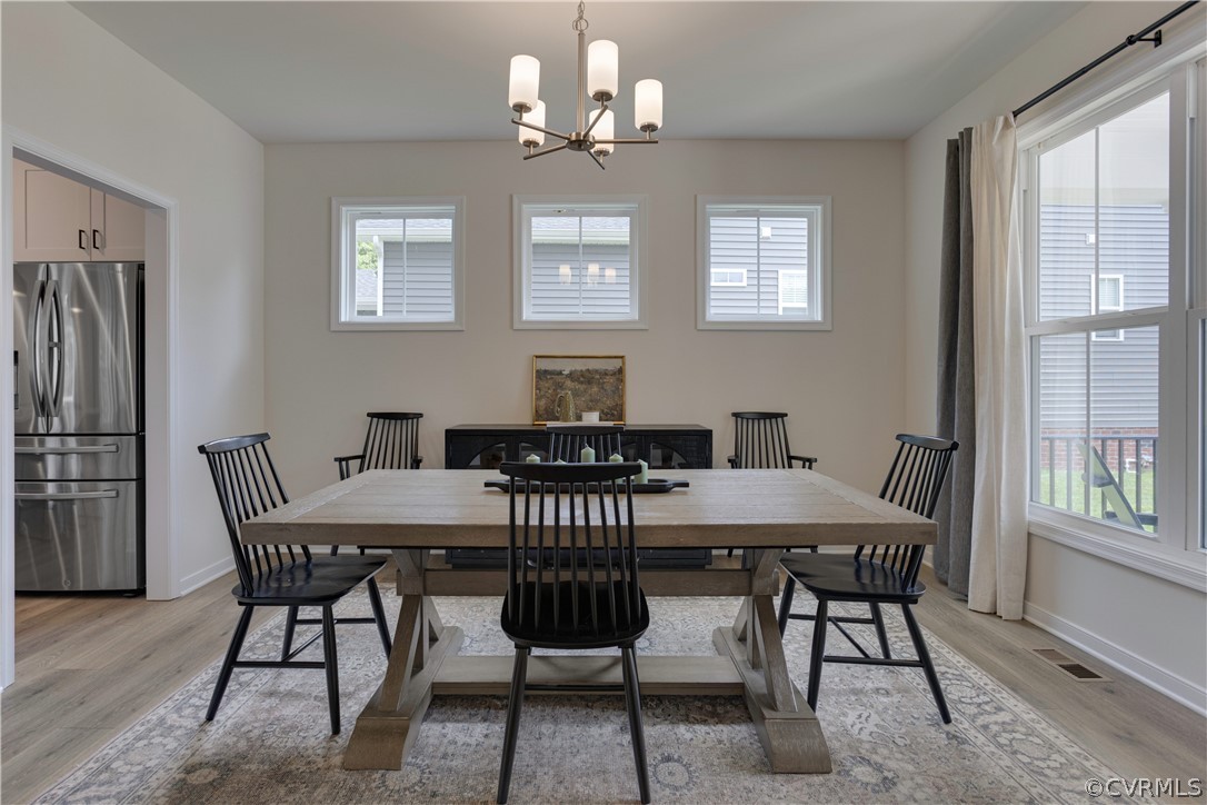 15736 Henningford Road Chesterfield, VA 23832 - Photo 8 of 50 Spacious Dining Room featuring a chandelier, light