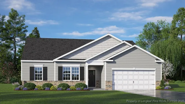 a view of a house with garden and yard