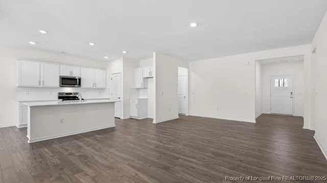 a view of kitchen with wooden floor