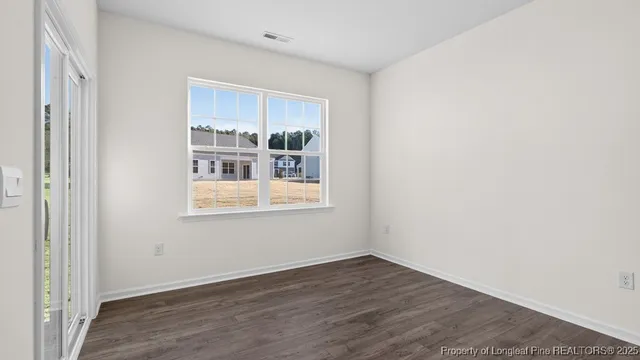 a view of a room that has a window in it