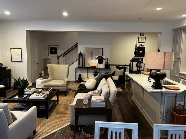 a living room with furniture window and a lamp