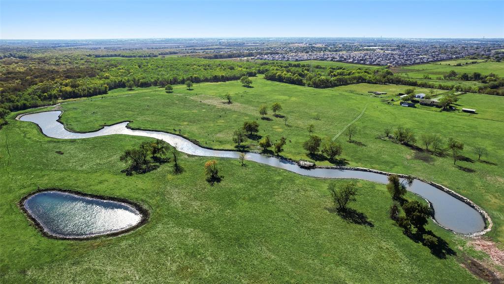 1396 Cemetery Road Royse City, TX 75189 - Photo 4 of 10 an aerial view of a golf course with a swimming pool